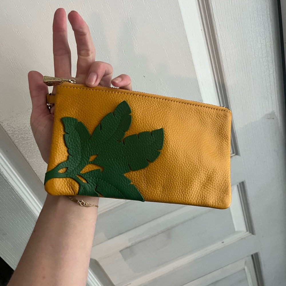 Ora Delphine Vibrant Yellow and Green Wristlet with Leaf Appliqué